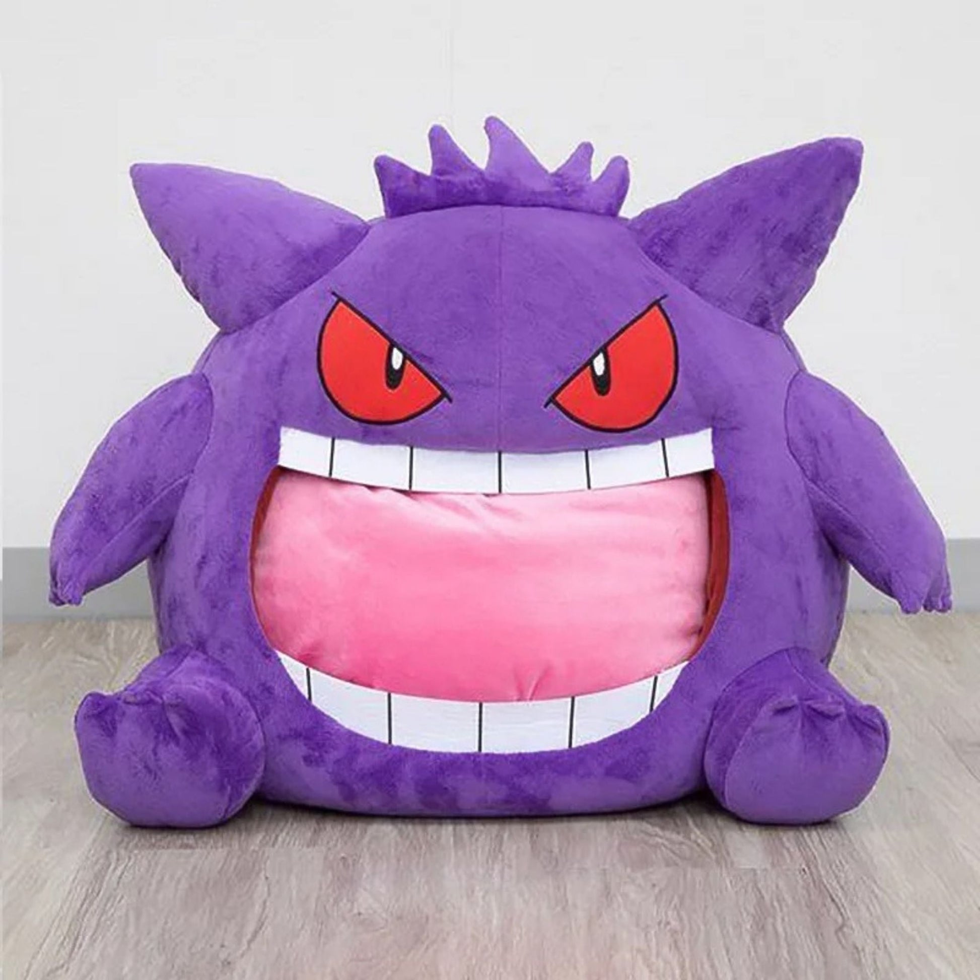 Blanket Folded In - Gengar Tongue Pillow Blanket Sleeping Pod For Afternoon Naps. Portable design for travel, work and on the go napping. Perfect gift for Pokémon fans.